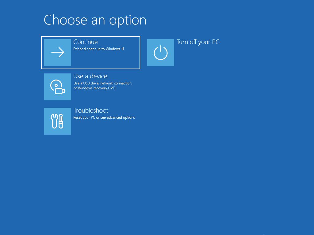 A screenshot showing the Windows Recovery Environment screen with an arrow pointing at the Troubleshoot button.