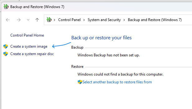 The "Create a system image" link is located in the top-left of the Backup and Restore (Windows 7) page in Control Panel.