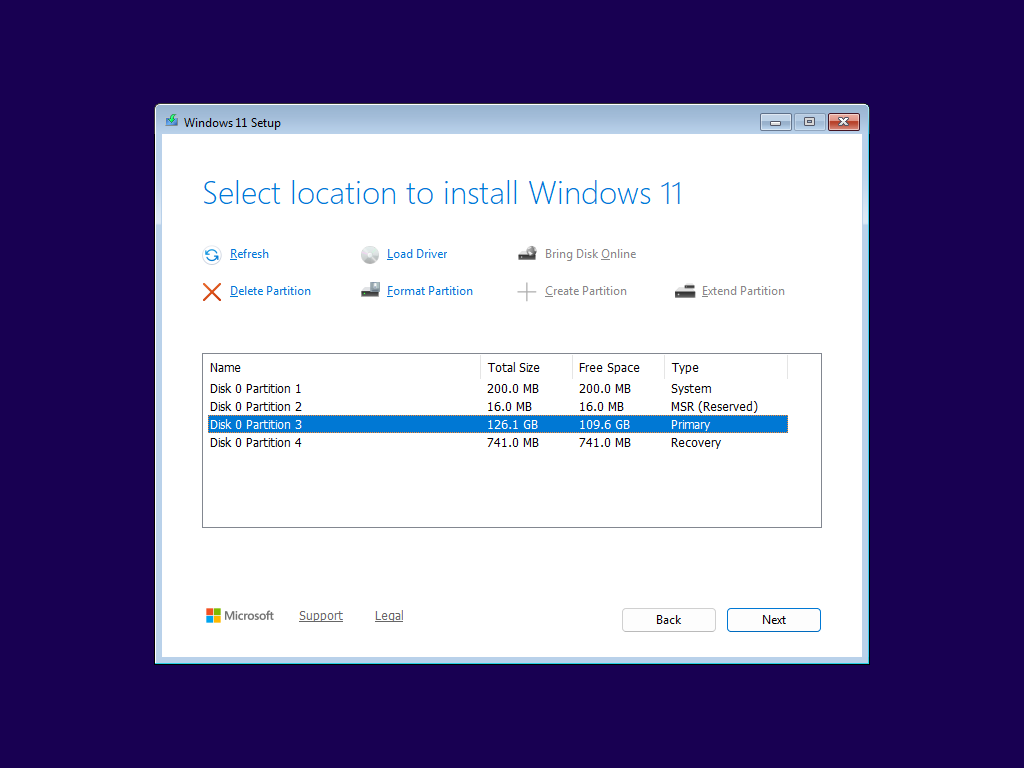 Windows Setup presents a list of detected partitions. Four partitions are shown, and the largest of the four is selected.