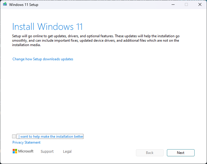 Windows 11 Setup shows an introductory screen, where you can change how the tool downloads updates, and choose whether to help make the installation better.