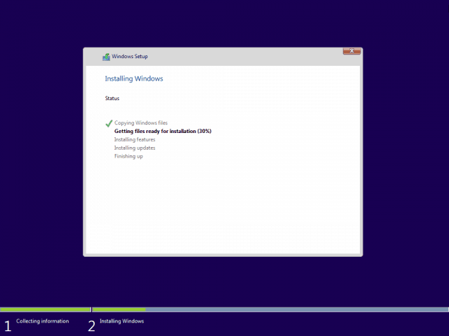 Windows Setup is installing Windows. There are five stages in the installation process: Copying Windows files, Getting files ready for installation, Installing features, Installing updates, and Finishing up. The status of the installation is shown as it progresses.