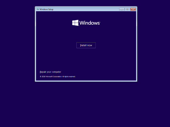 Windows Setup presents two options: "Install now" or "Repair your computer".