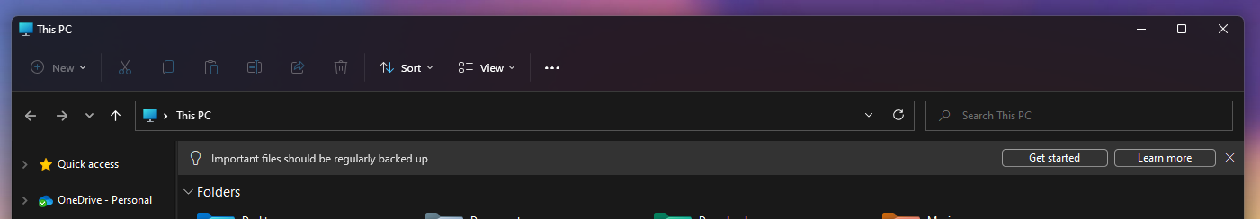 A banner message in File Explorer that says "Important files should be regularly backed up".